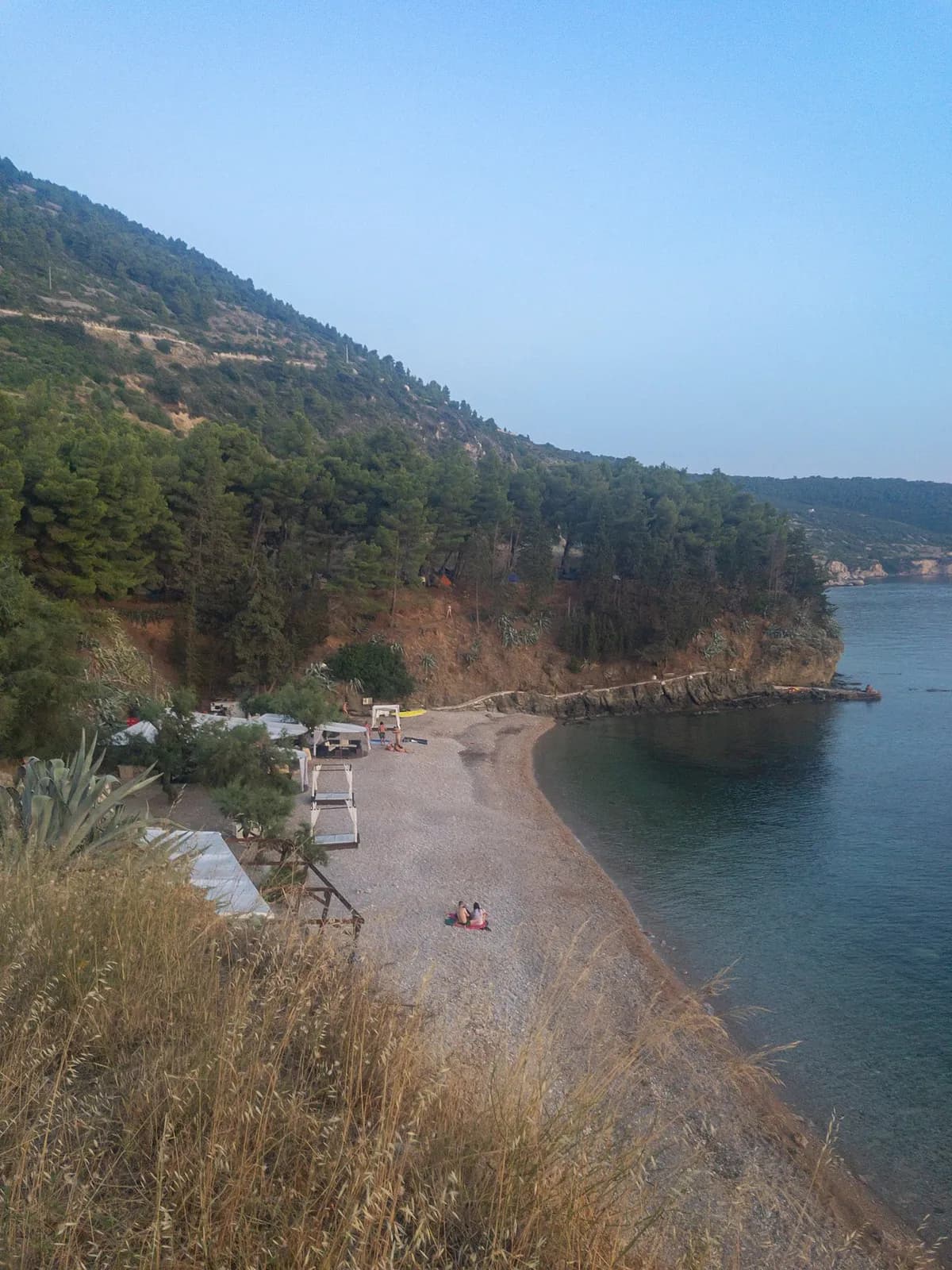 Rocky beach in Komiza on Vis island, Croatia